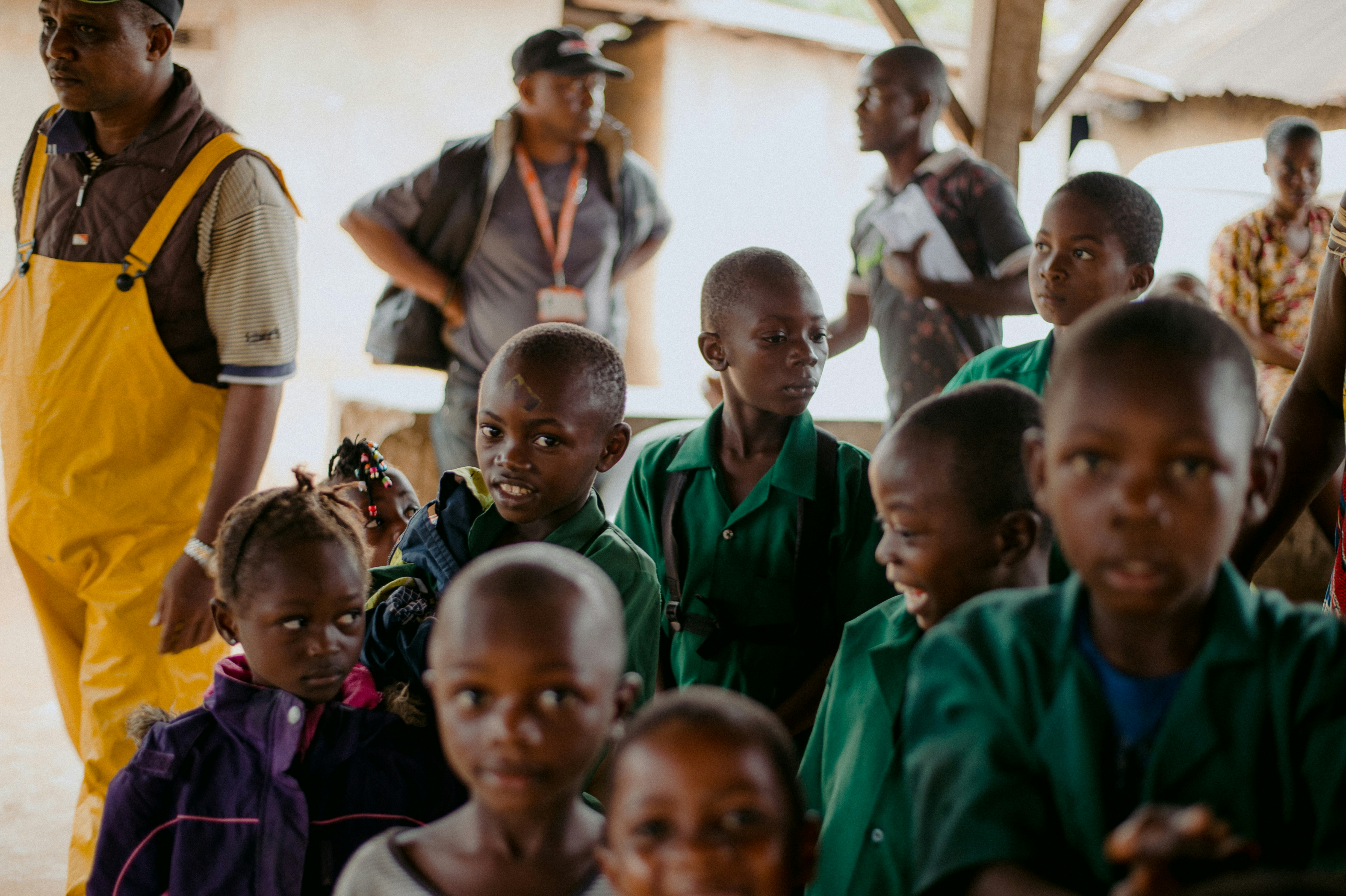 children in green school uniform